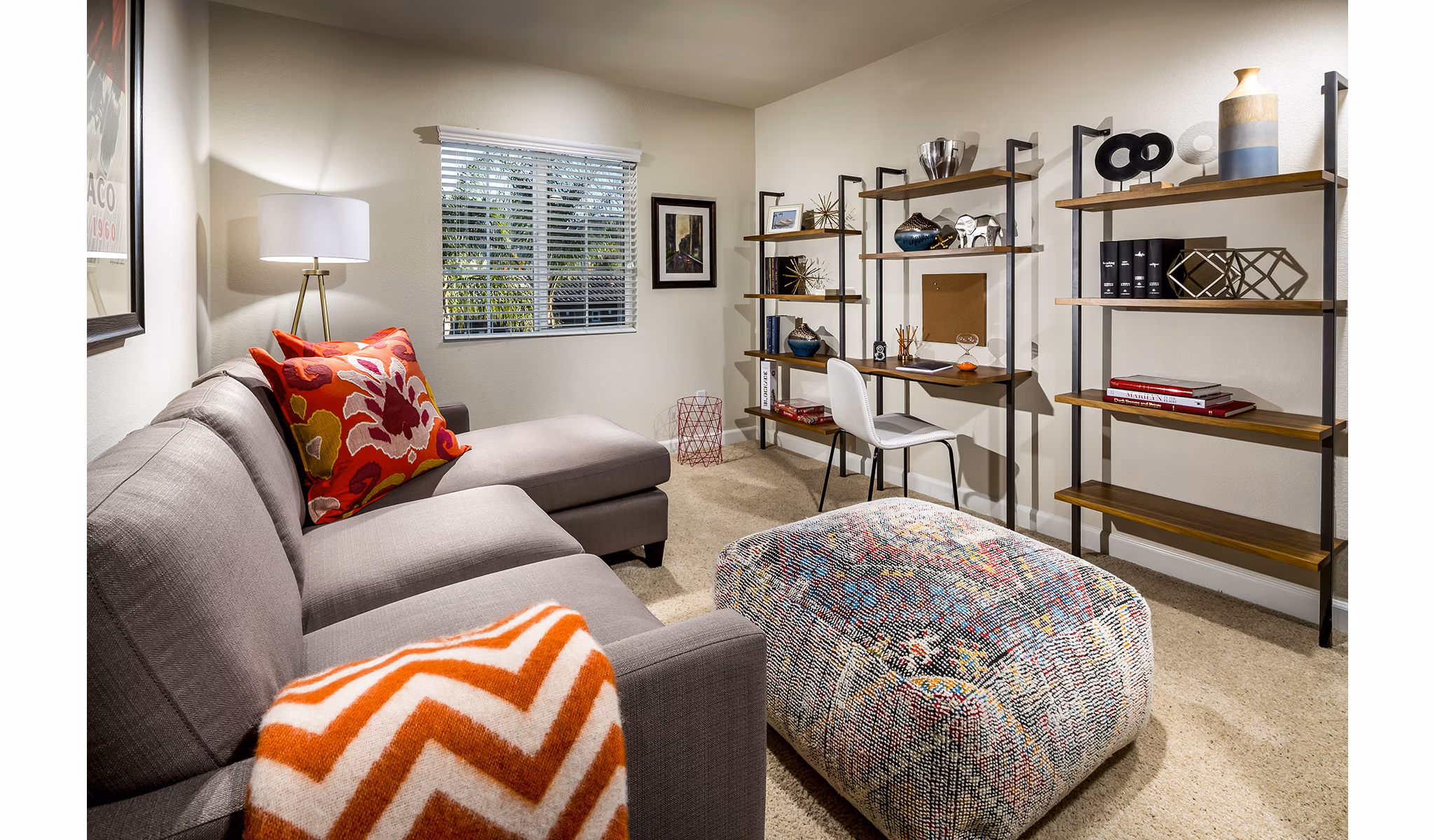 Cozy living room featuring natural lighting and modern decor in Townhomes at Lost Canyon Apartments