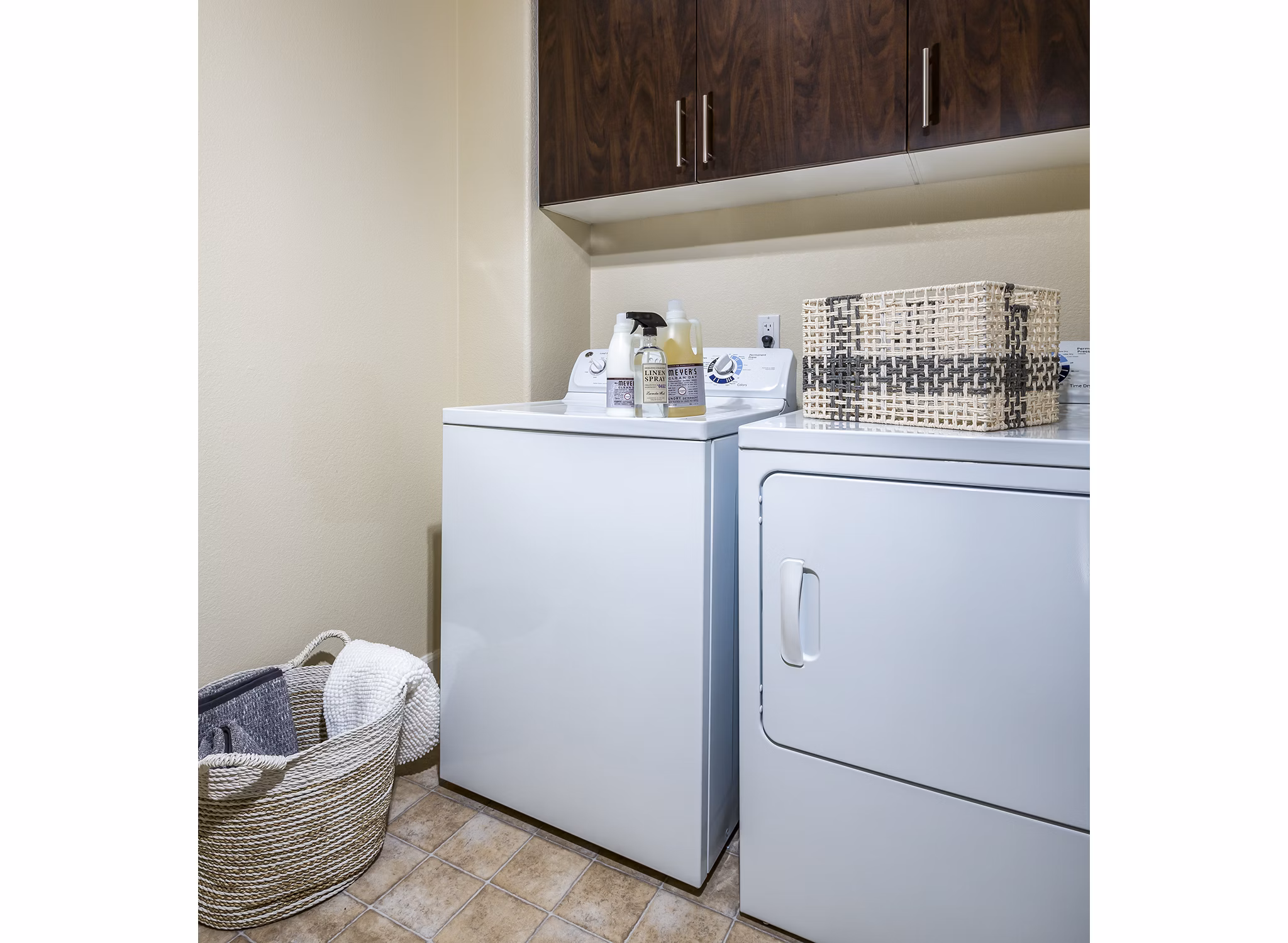 Laundry room with energy-efficient appliances at Townhomes at Lost Canyon Apartments