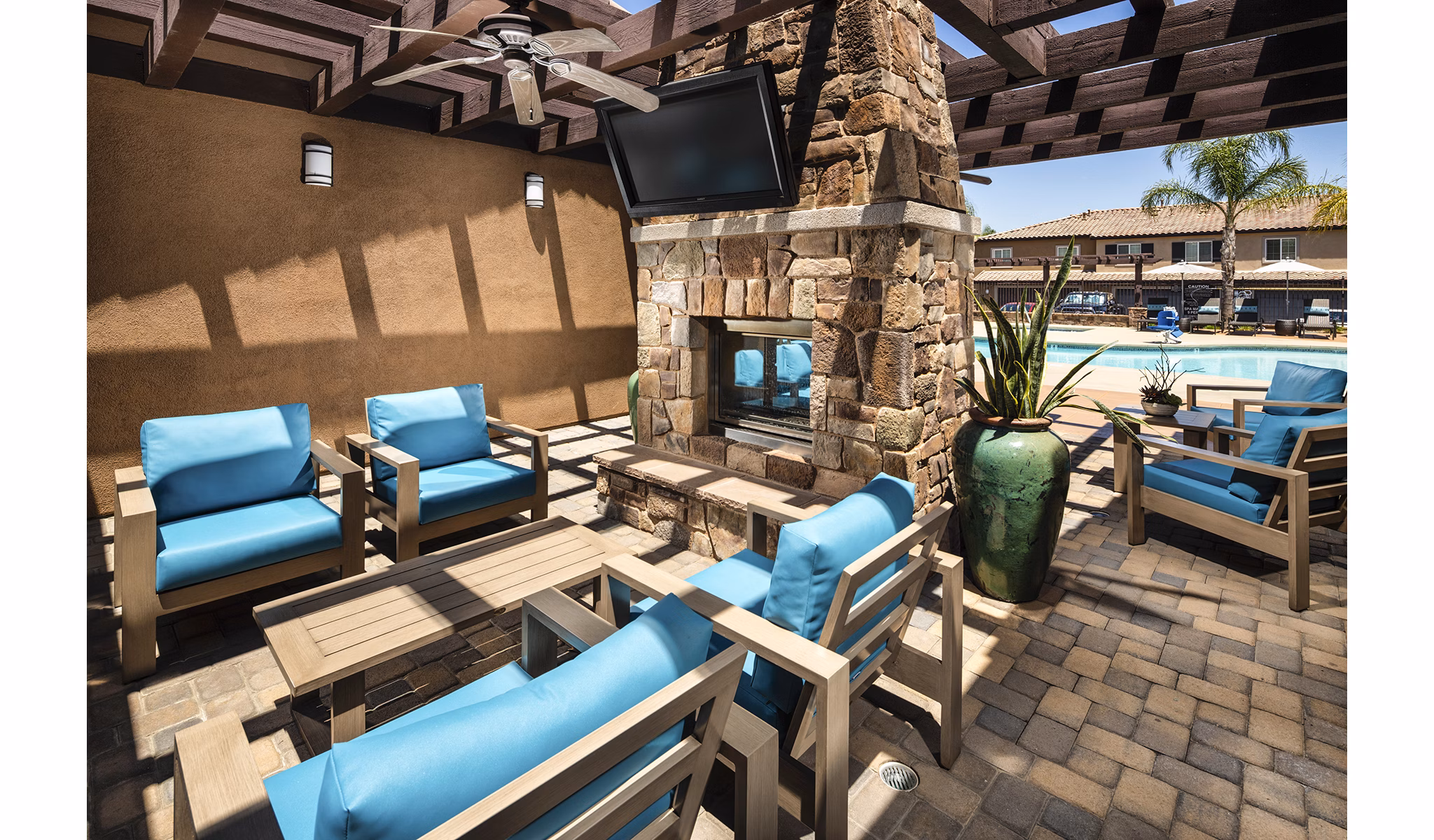 Fire pit lounge area at Townhomes at Lost Canyon Apartments, a luxury Greystar property, offering outdoor relaxation and community gathering space