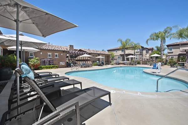 Resort-style pool at Townhomes at Lost Canyon Apartments offering relaxation and leisure in a scenic setting