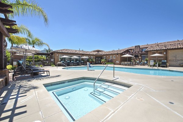 Relaxing hot tub at Townhomes at Lost Canyon Apartments, ideal for unwinding after a long day