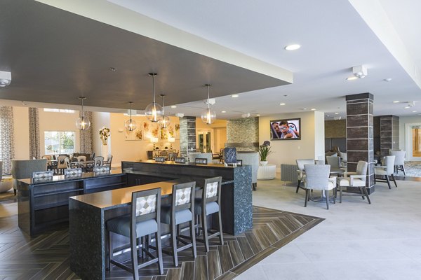 Elegant clubhouse featuring modern decor and seating at Overture Sugar Land, ideal for social gatherings and community events
