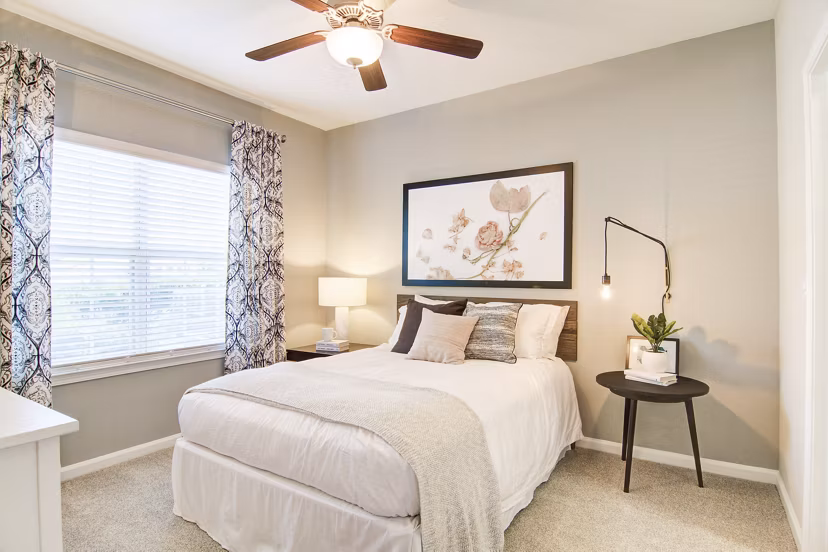 Cozy bedroom with contemporary decor at Avana North Point Apartments