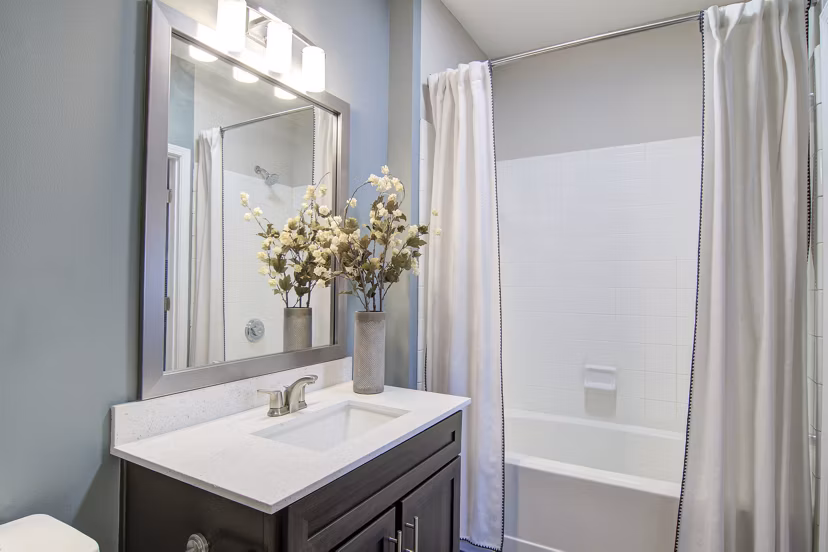 Contemporary bathroom with sleek fixtures at Avana North Point Apartments