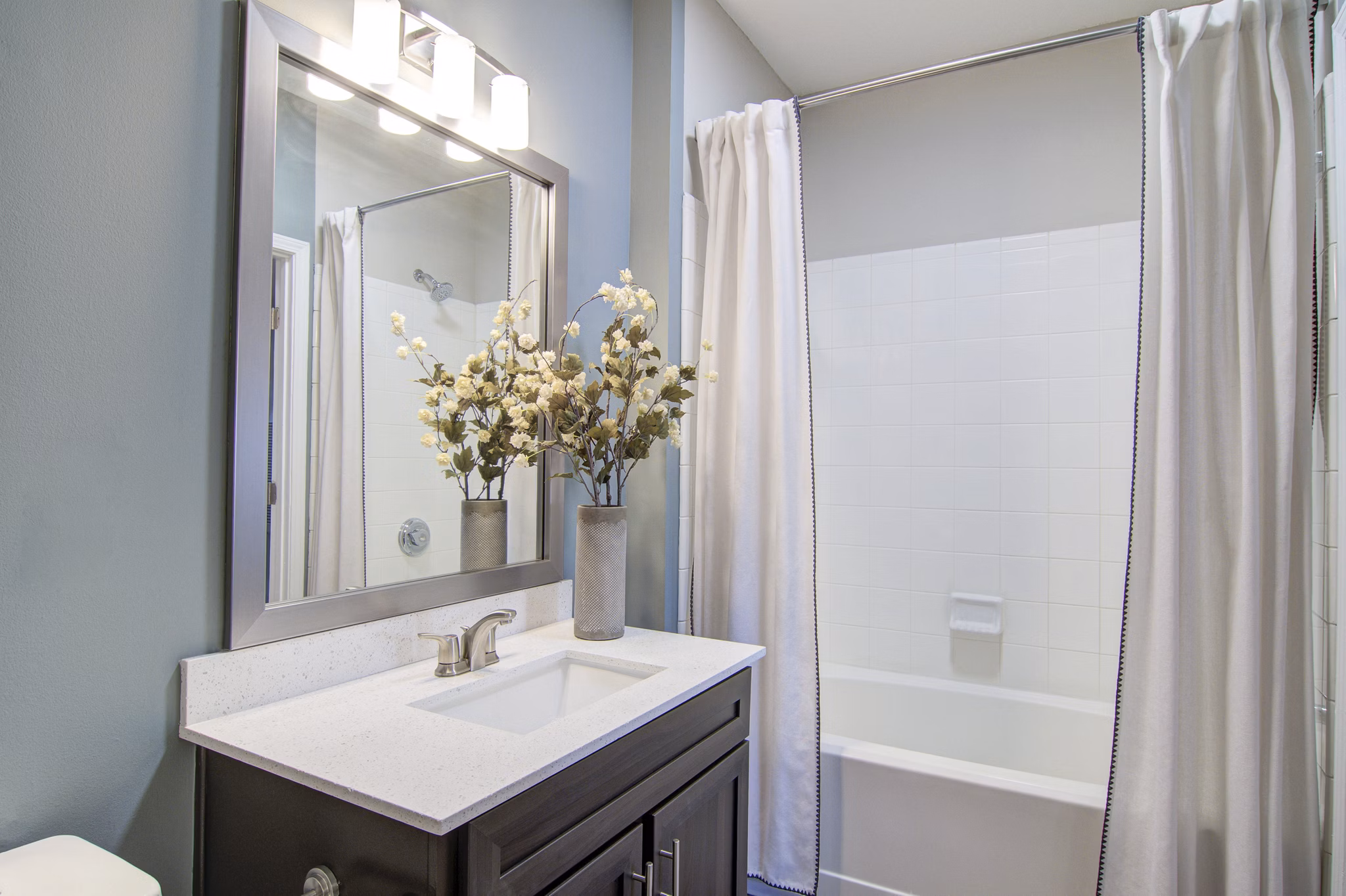 Contemporary bathroom with sleek fixtures at Avana North Point Apartments