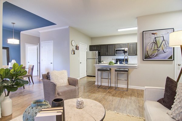 Spacious living room with modern decor at Avana North Point luxury apartments
