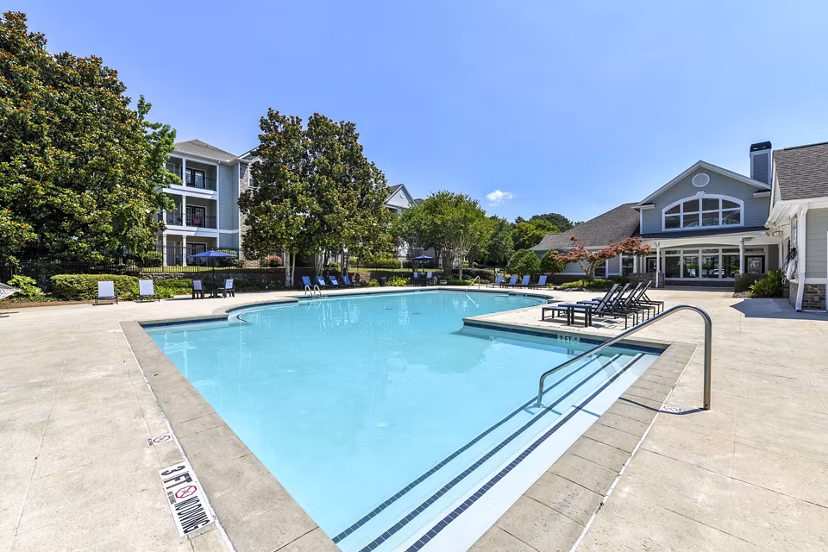 Infinity-edge pool at Avana North Point Apartments offering serene luxury and relaxation