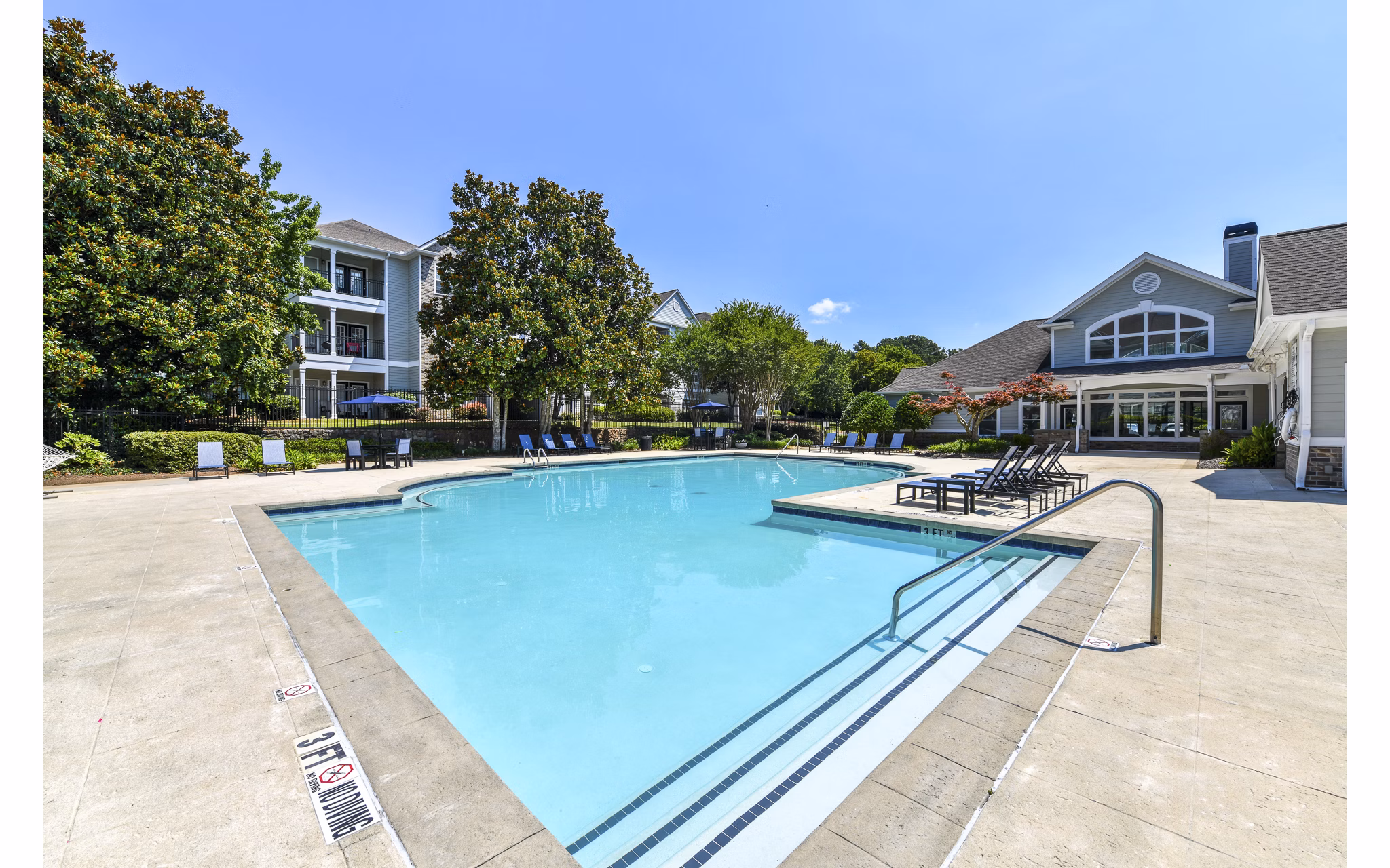 Infinity-edge pool at Avana North Point Apartments offering serene luxury and relaxation
