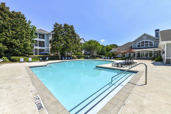 Infinity-edge pool at Avana North Point Apartments offering serene luxury and relaxation