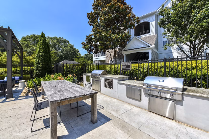 Patio with stylish outdoor seating at Avana North Point Apartments, luxury living in Alpharetta