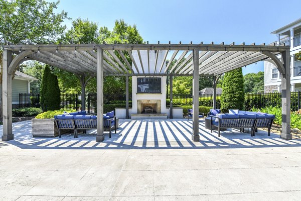 Courtyard with landscaped gardens at Avana North Point Apartments, a luxurious Greystar property in a serene setting