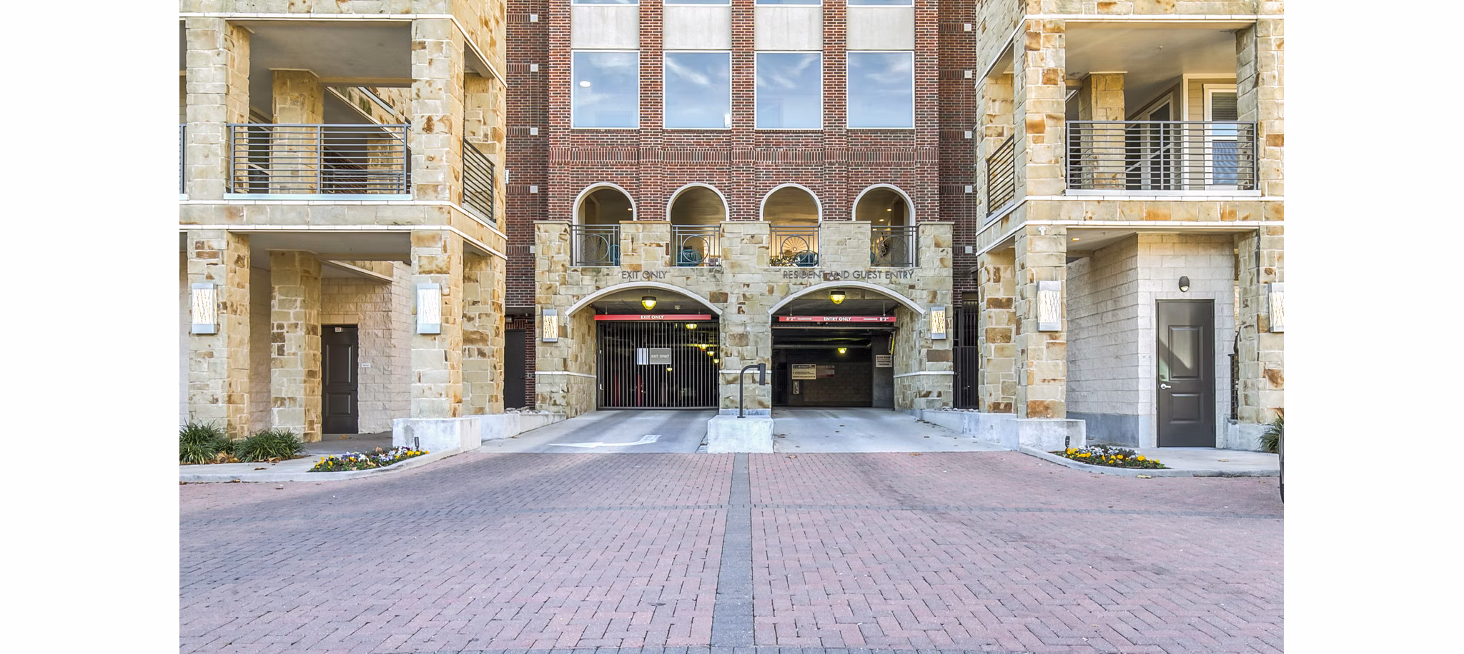 Spacious parking garage at Landmark on Lovers Apartments, offering convenient access for residents in our luxury Dallas community