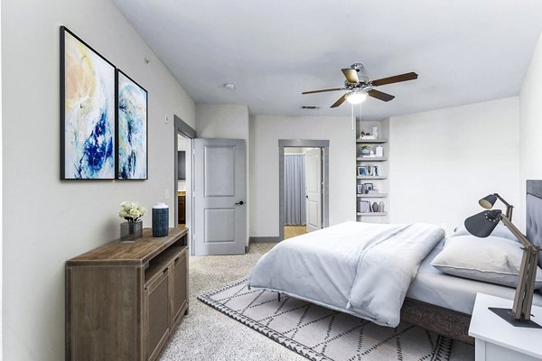 Spacious bedroom featuring modern furnishings at Landmark on Lovers Apartments, ideal for comfortable living in a luxury setting