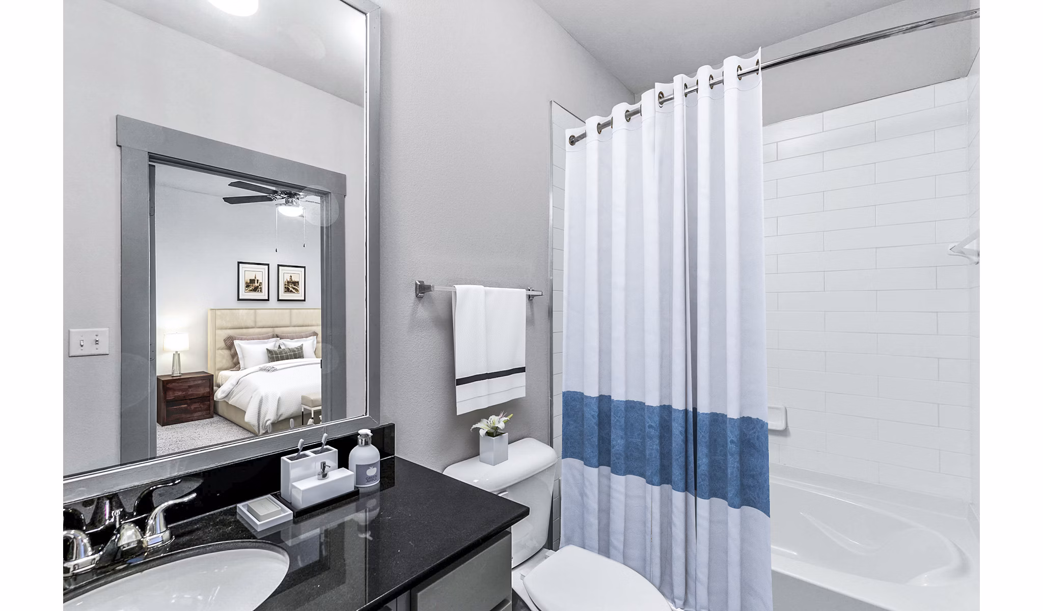 Stylish bathroom with modern fixtures at Landmark on Lovers Apartments