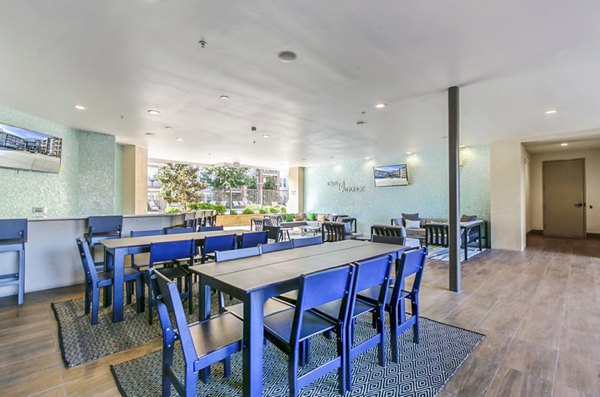 Cozy patio with modern seating at Landmark on Lovers Apartments, perfect for relaxation and leisure in a luxury setting
