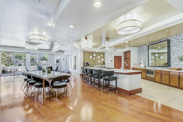Clubhouse interior featuring a modern communal space with plush seating at Landmark on Lovers Apartments, perfect for social gatherings and events