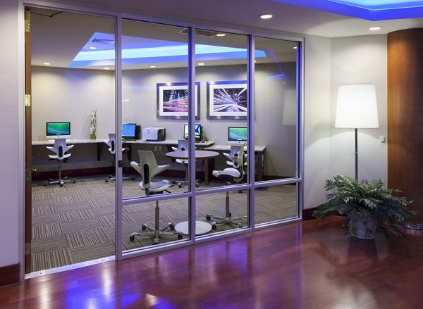 Modern business center with open workspace at Landmark on Lovers Apartments, ideal for professionals seeking luxury living in vibrant community setting
