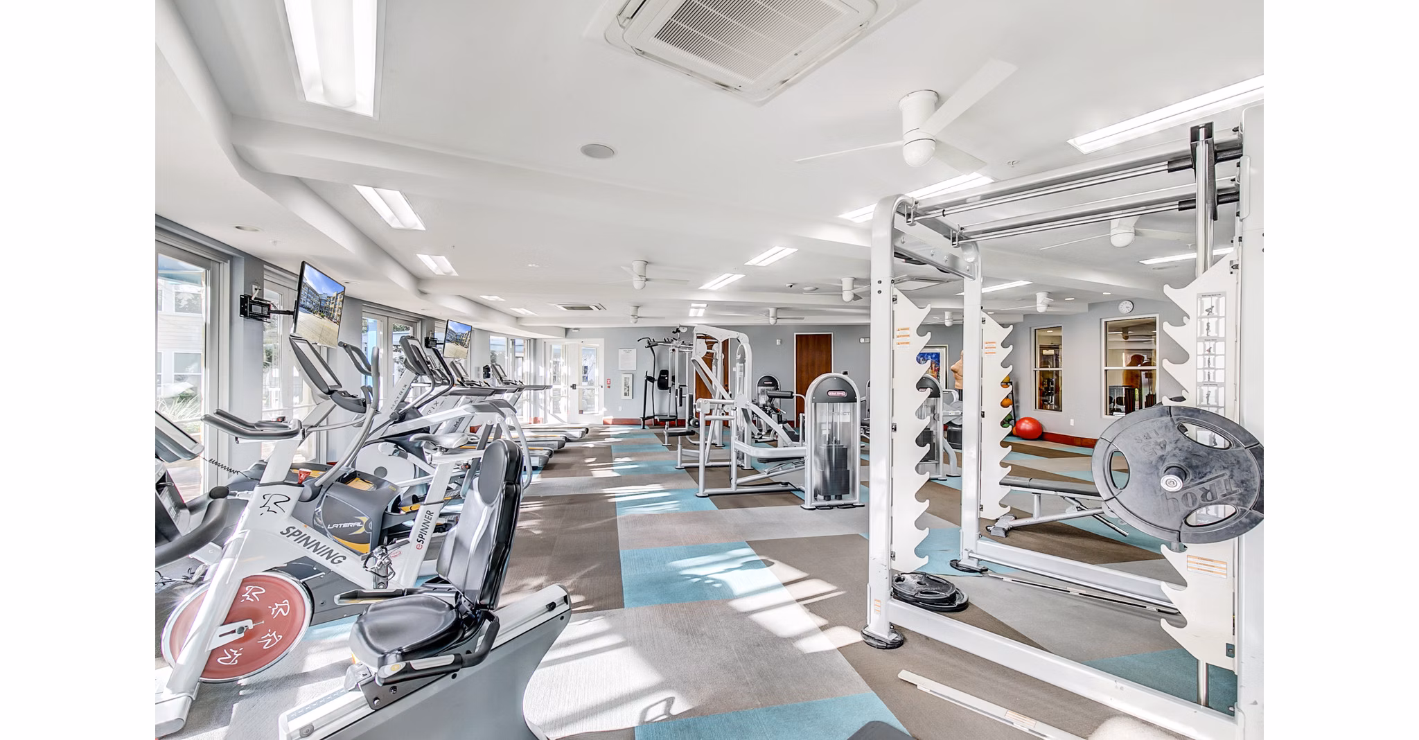 Modern fitness center with state-of-the-art equipment at Landmark on Lovers Apartments