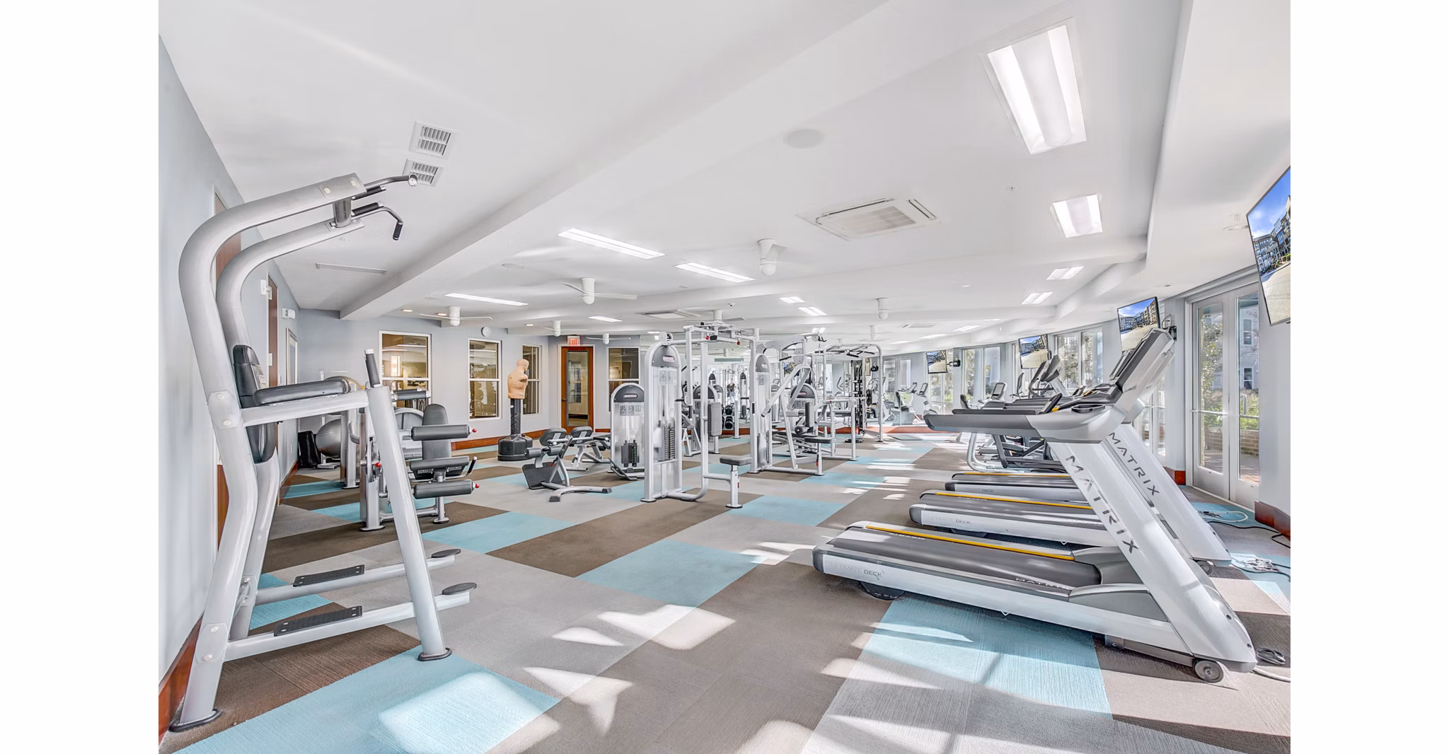 State-of-the-art fitness center at Landmark on Lovers Apartments with modern exercise equipment and spacious layout