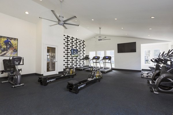 State-of-the-art fitness center at Brookside 112 Apartments featuring modern equipment and spacious workout areas