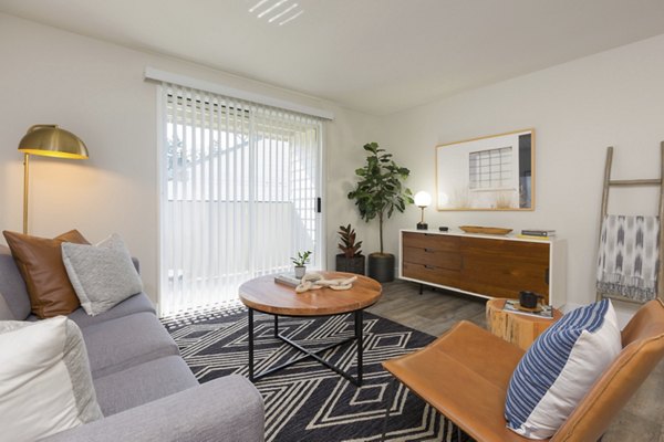 Spacious living room with modern decor at Brookside 112 Apartments