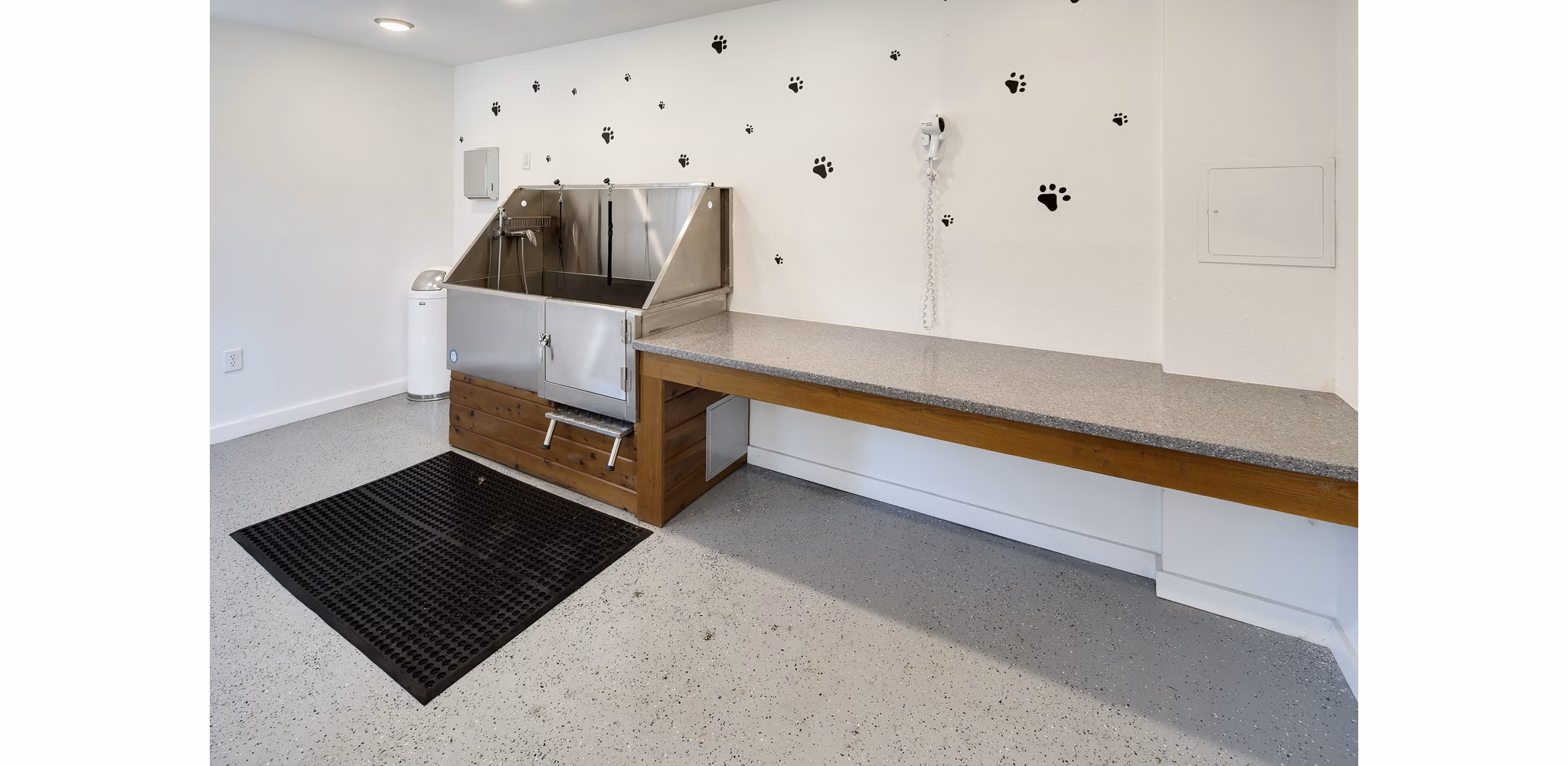 Dog wash station at Brookside 112 Apartments offering pet care amenities for luxury living