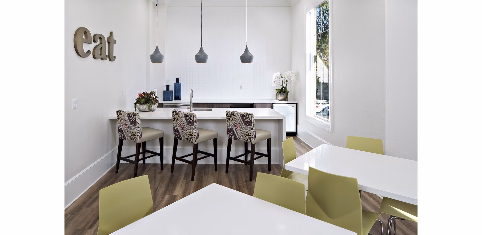 Clubhouse with modern design and cozy seating at Amerige Pointe Apartments in a luxury setting