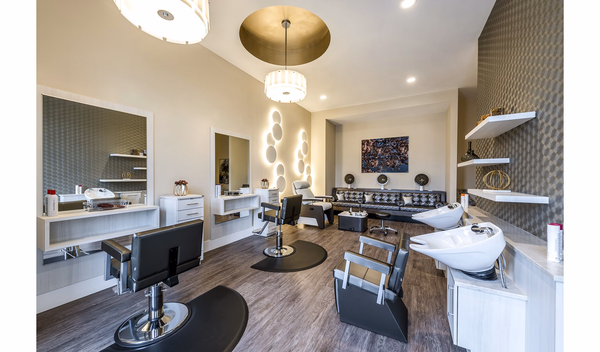 Elegant salon with plush seating and modern decor at Overture Fair Ridge Apartments