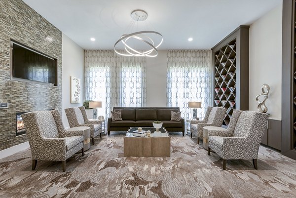 Clubhouse featuring modern leisure spaces at Overture Fair Ridge Apartments