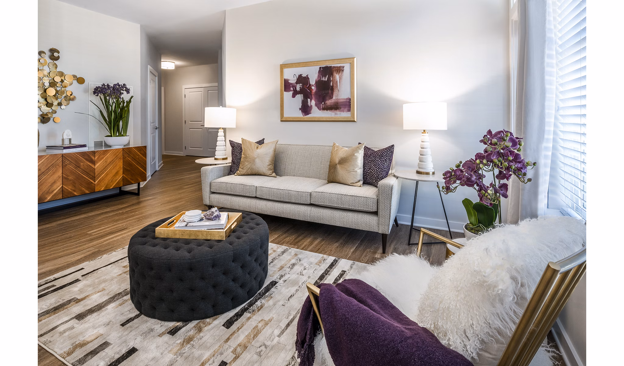 Spacious living room with modern decor in Overture Fair Ridge Apartments