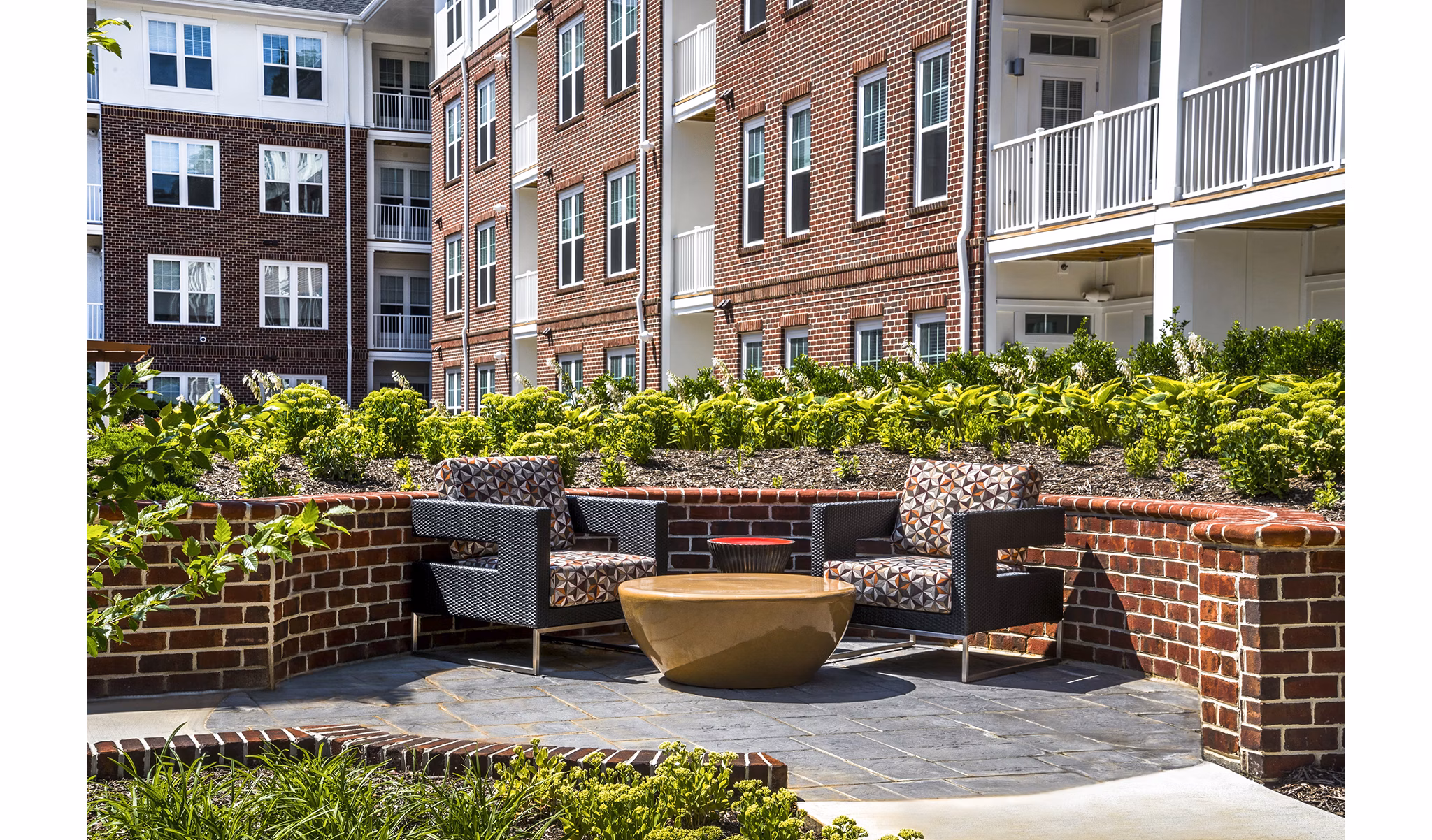 Cozy outdoor fire pit area at Overture Fair Ridge Apartments, perfect for relaxation and social gatherings
