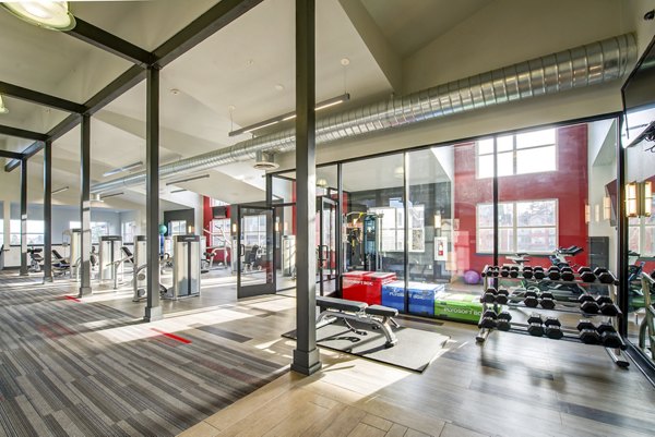 Fitness center featuring modern equipment at Avana One Six Four Apartments, ideal for residents prioritizing health and wellness
