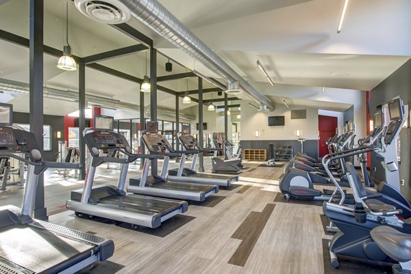 Fitness center featuring state-of-the-art equipment at Avana One Six Four Apartments