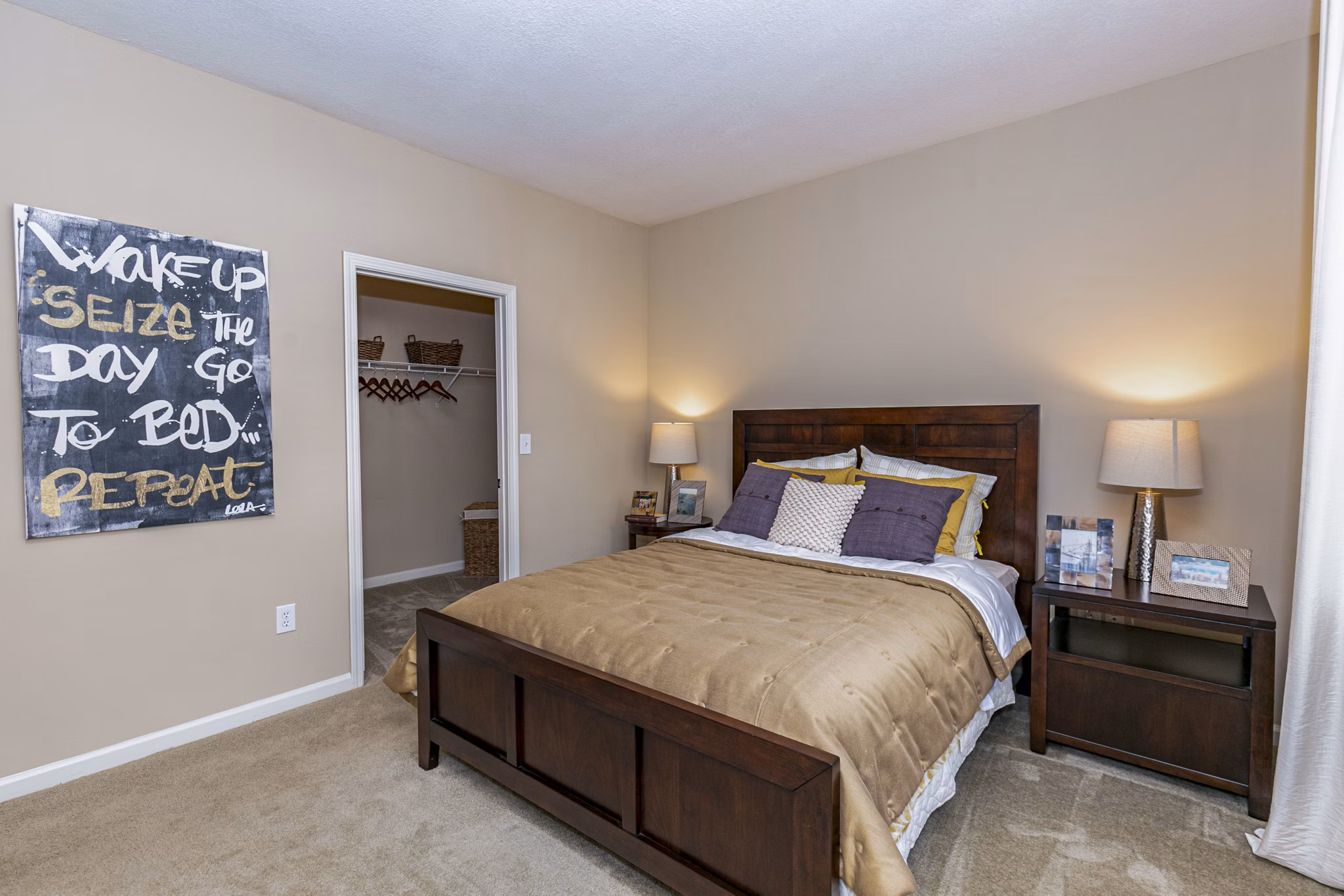Modern bedroom with ample natural light at Andover at Johns Creek Apartments