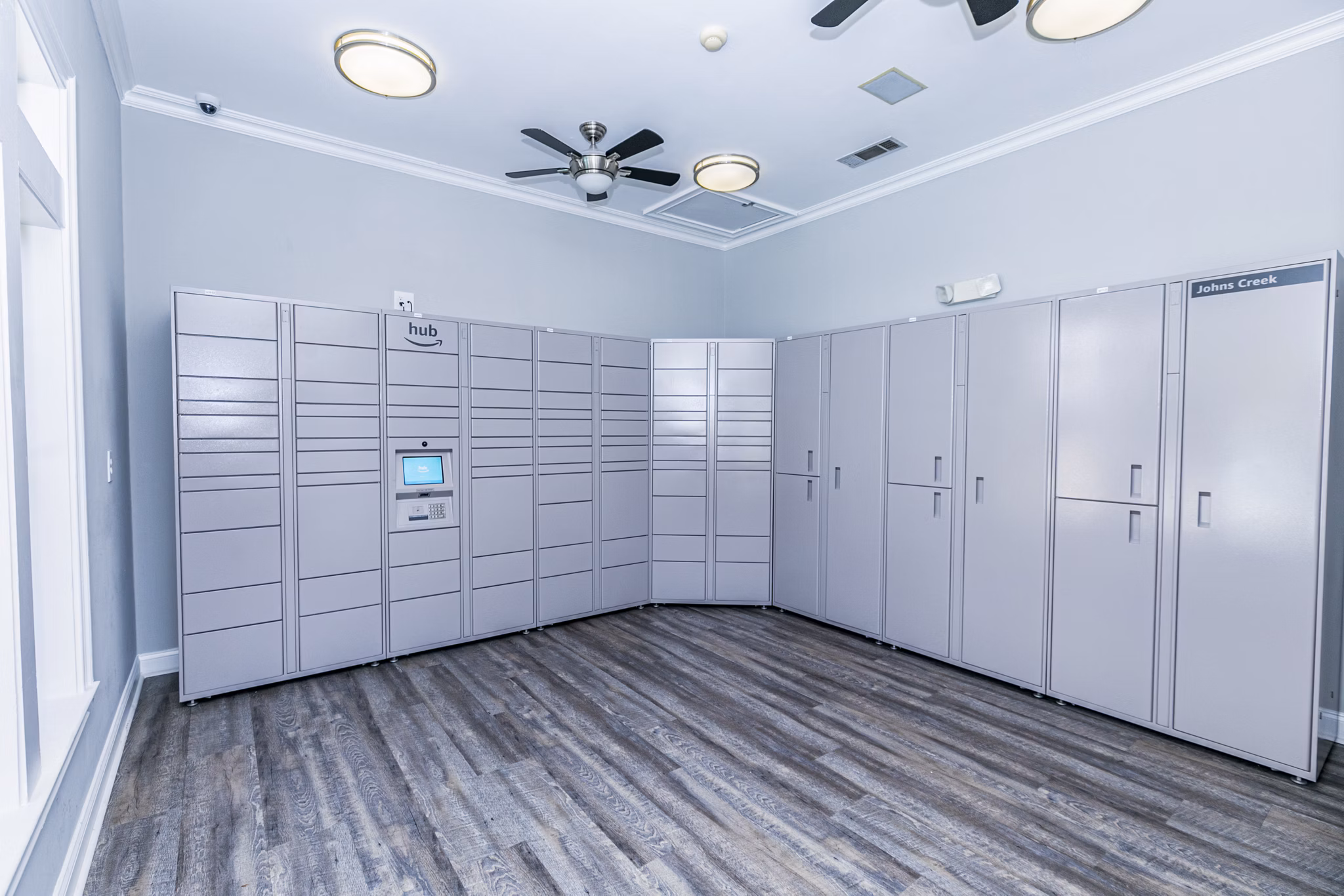 Parcel locker for residents at Andover at Johns Creek Apartments, convenient package storage solution for luxury living