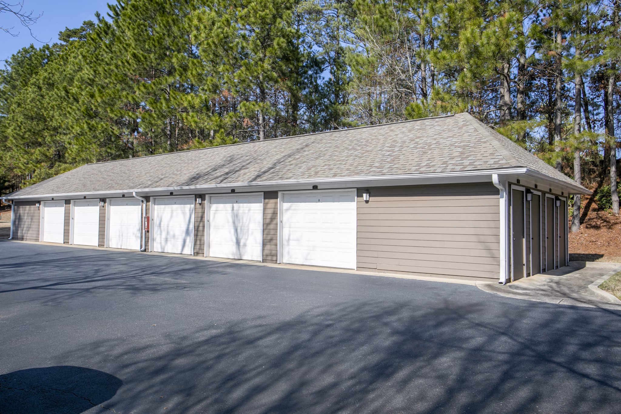Covered parking facilities at Andover at Johns Creek Apartments, offering convenient and secure vehicle storage for residents