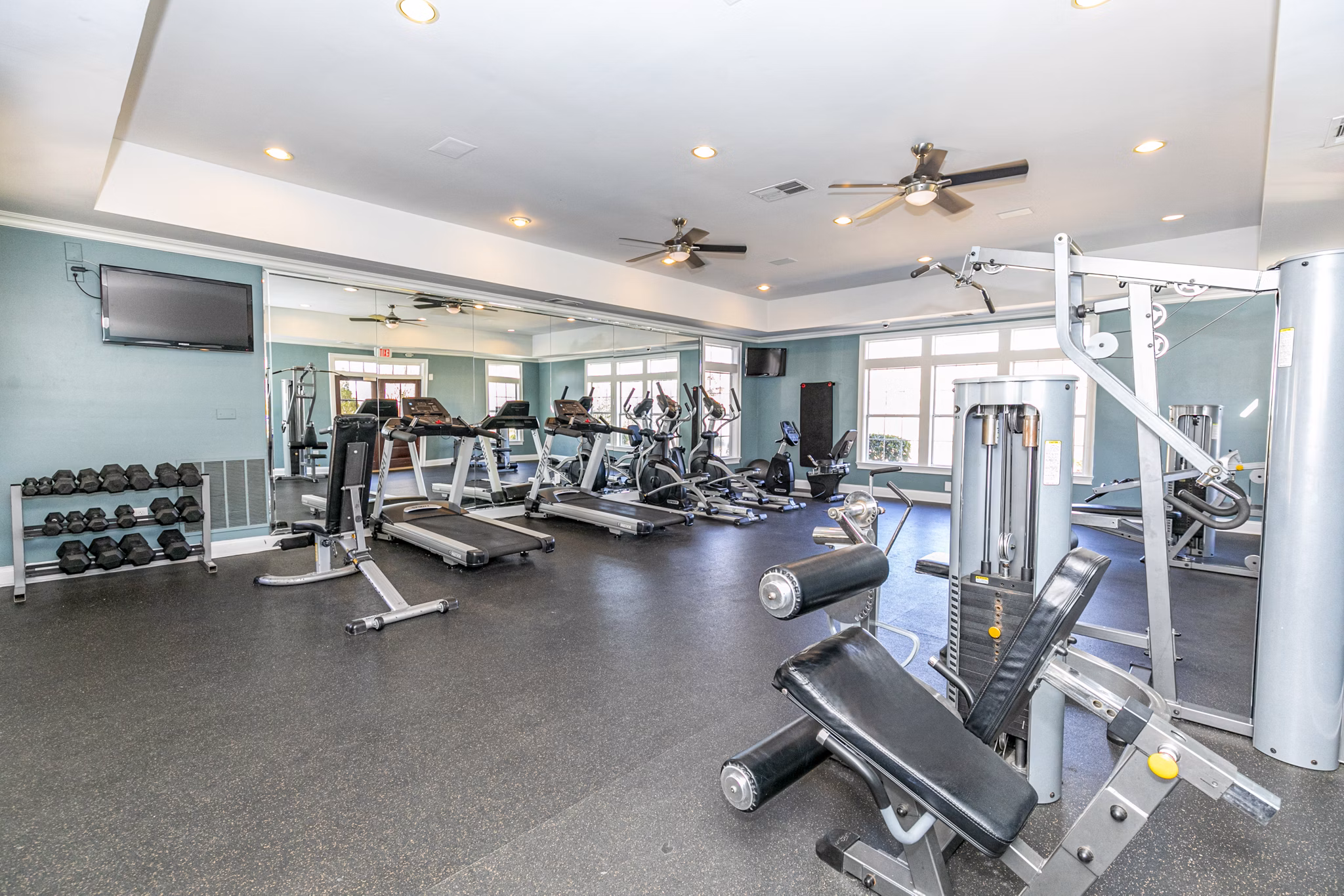 Modern fitness center with state-of-the-art equipment at Andover at Johns Creek Apartments