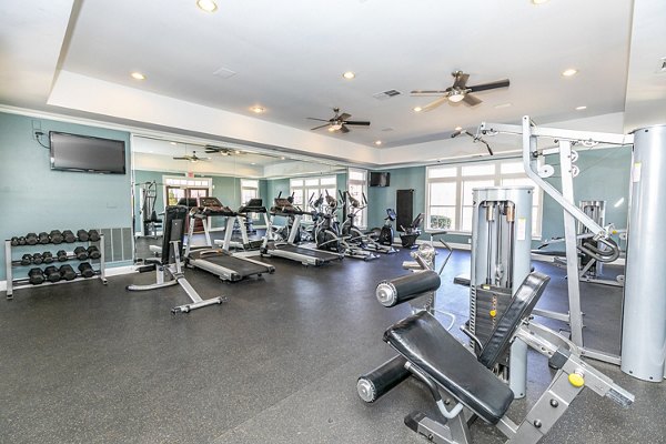 Modern fitness center with state-of-the-art equipment at Andover at Johns Creek Apartments
