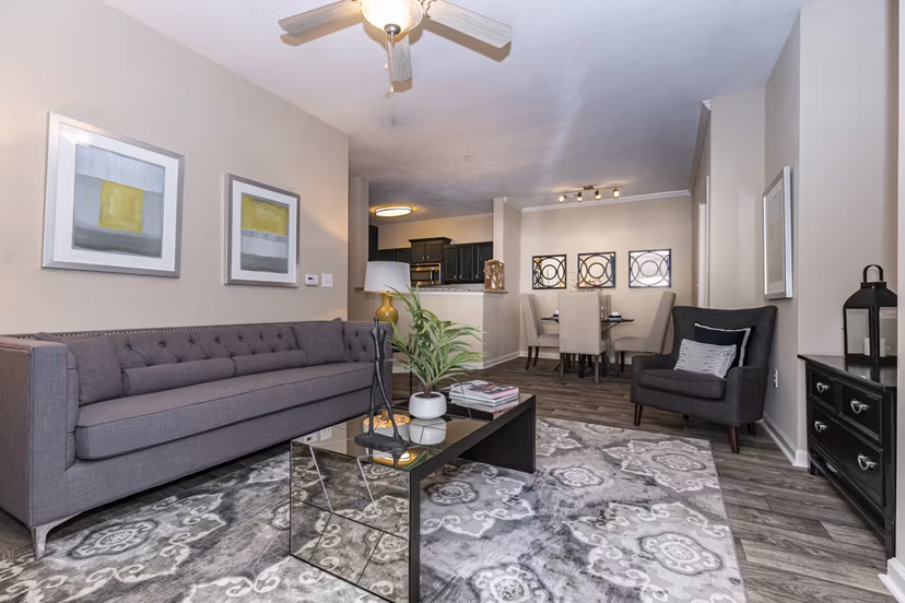 Spacious living room with modern decor in Andover at Johns Creek Apartments