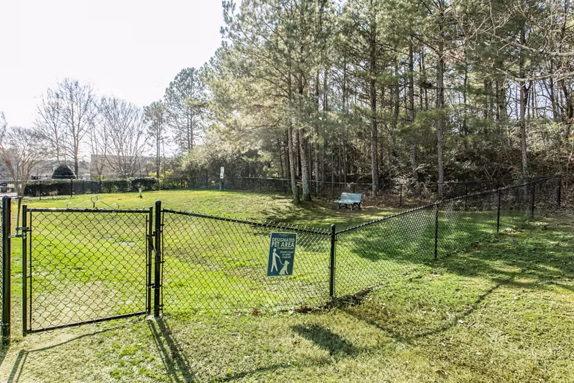 Dog park with agility equipment at Andover at Johns Creek Apartments