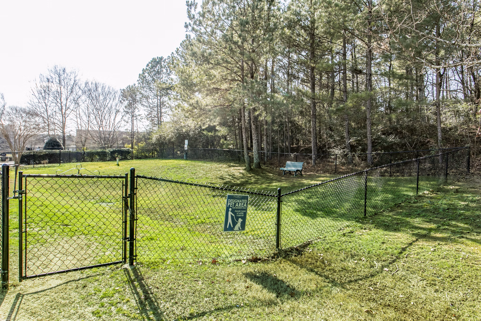 Dog park with agility equipment at Andover at Johns Creek Apartments
