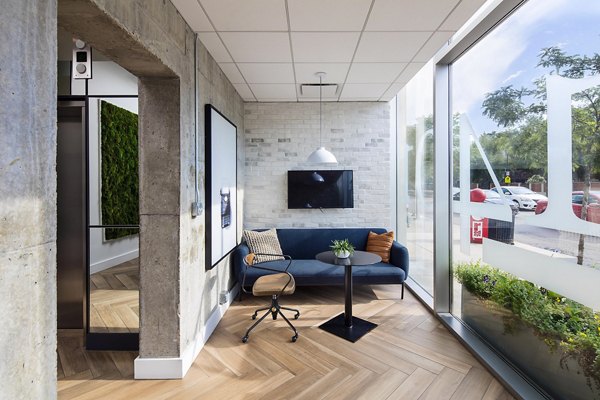 Clubhouse at 1401 S State Apartments: Modern design and inviting community spaces for socializing and relaxation