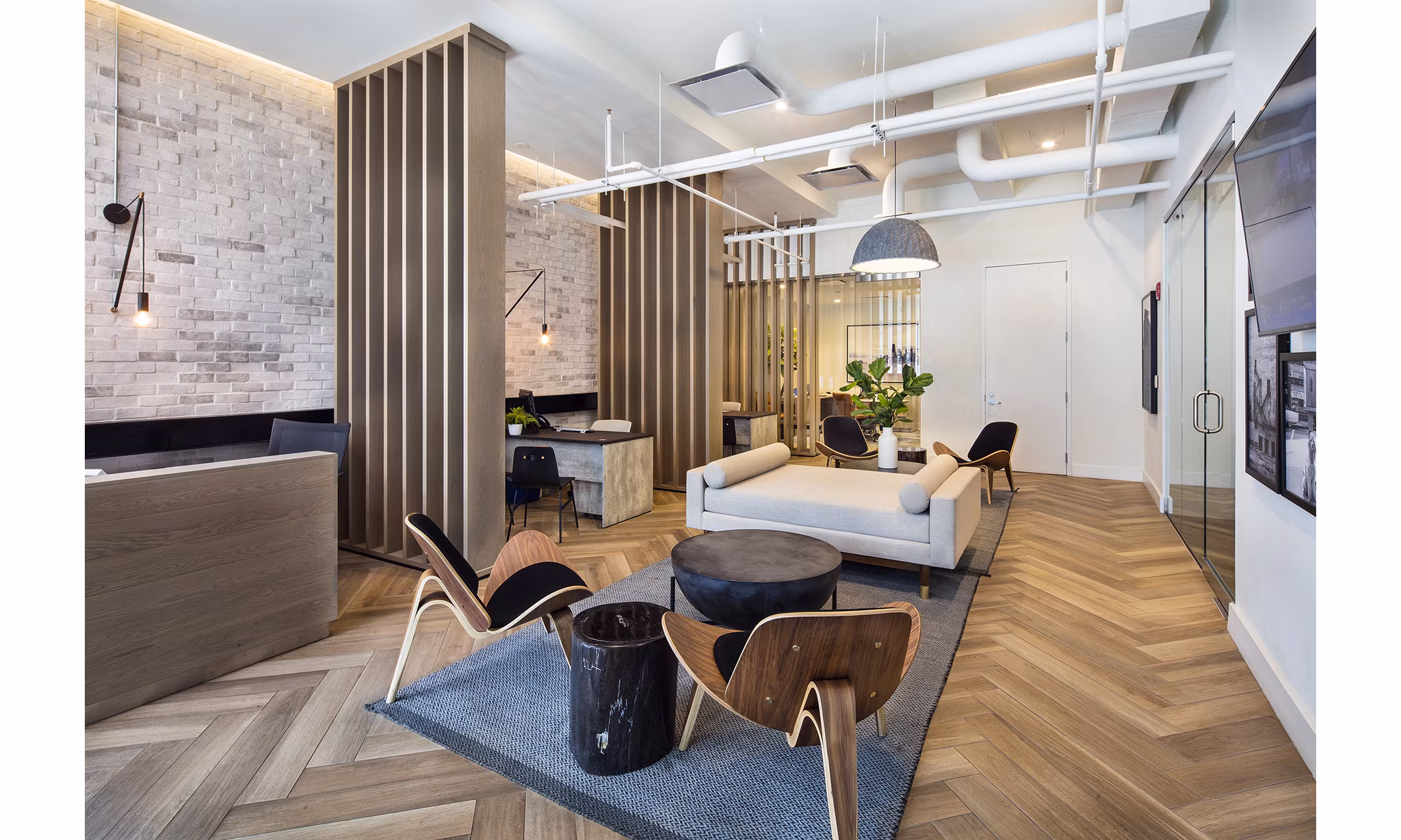 Clubhouse featuring modern design and plush seating at 1401 S State Apartments
