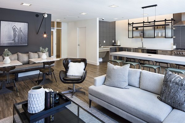 Clubhouse with modern decor and seating at 1401 S State Apartments