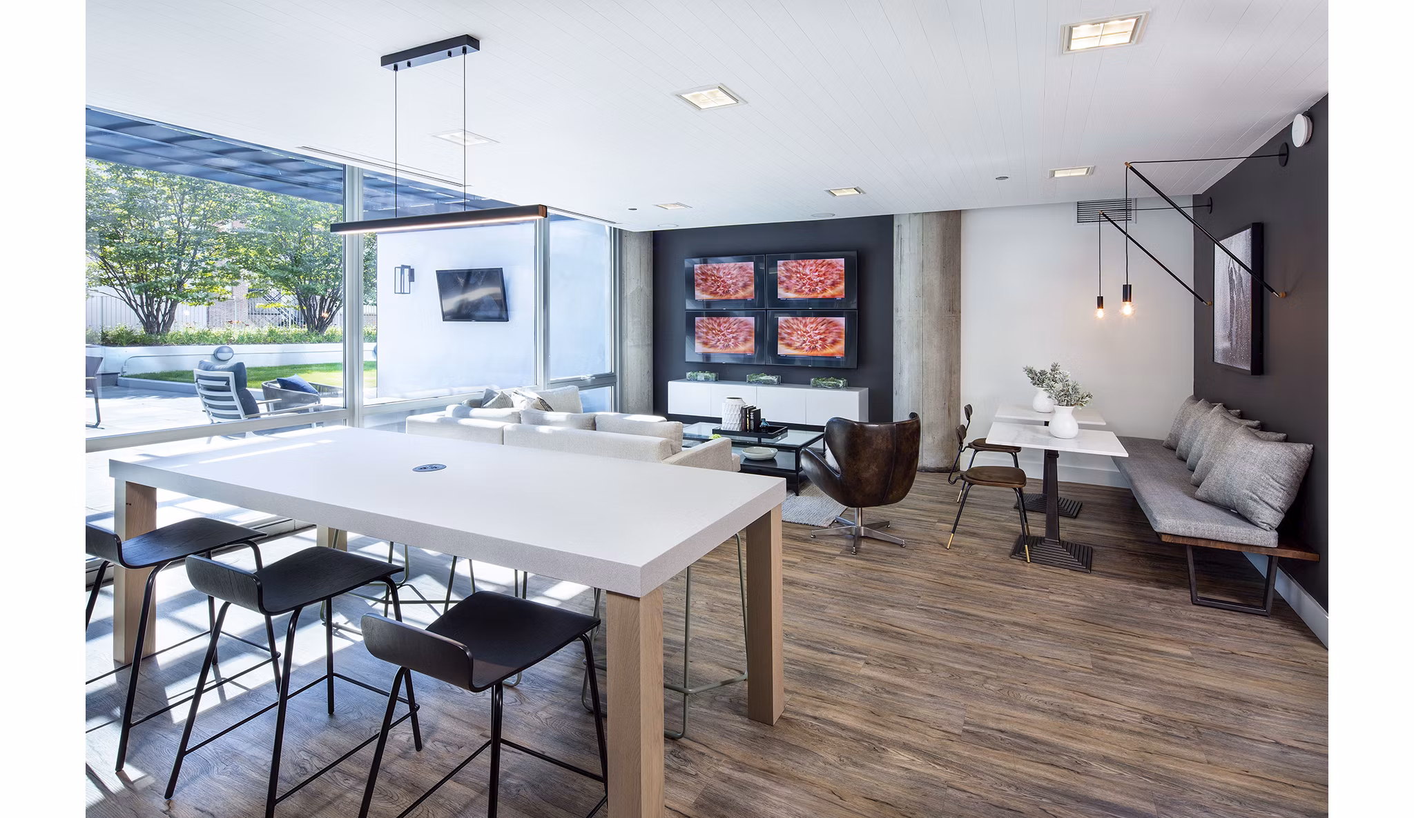 Clubhouse with modern design and cozy seating at 1401 S State Apartments, offering a welcoming space for residents to relax and socialize