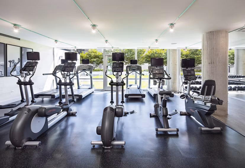 Modern fitness center featuring state-of-the-art equipment at 1401 S State Apartments