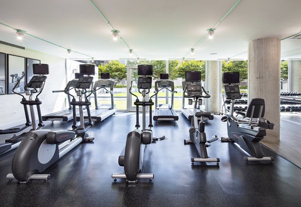 Modern fitness center featuring state-of-the-art equipment at 1401 S State Apartments
