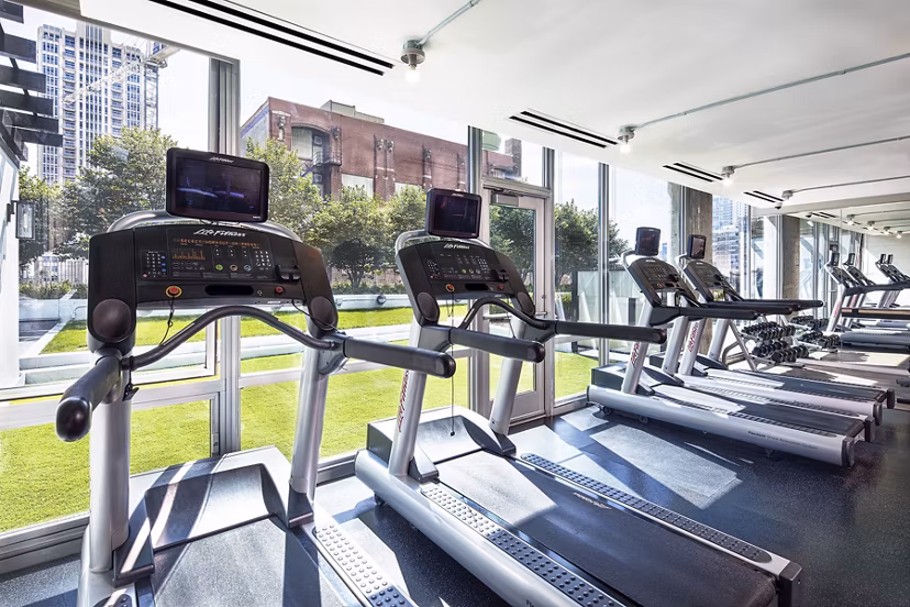 State-of-the-art fitness center with modern equipment at 1401 S State Apartments