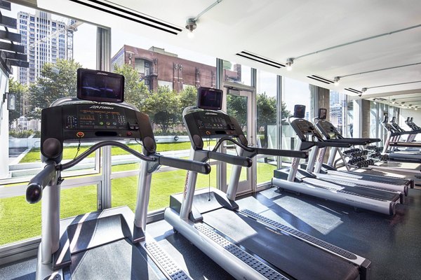 State-of-the-art fitness center with modern equipment at 1401 S State Apartments
