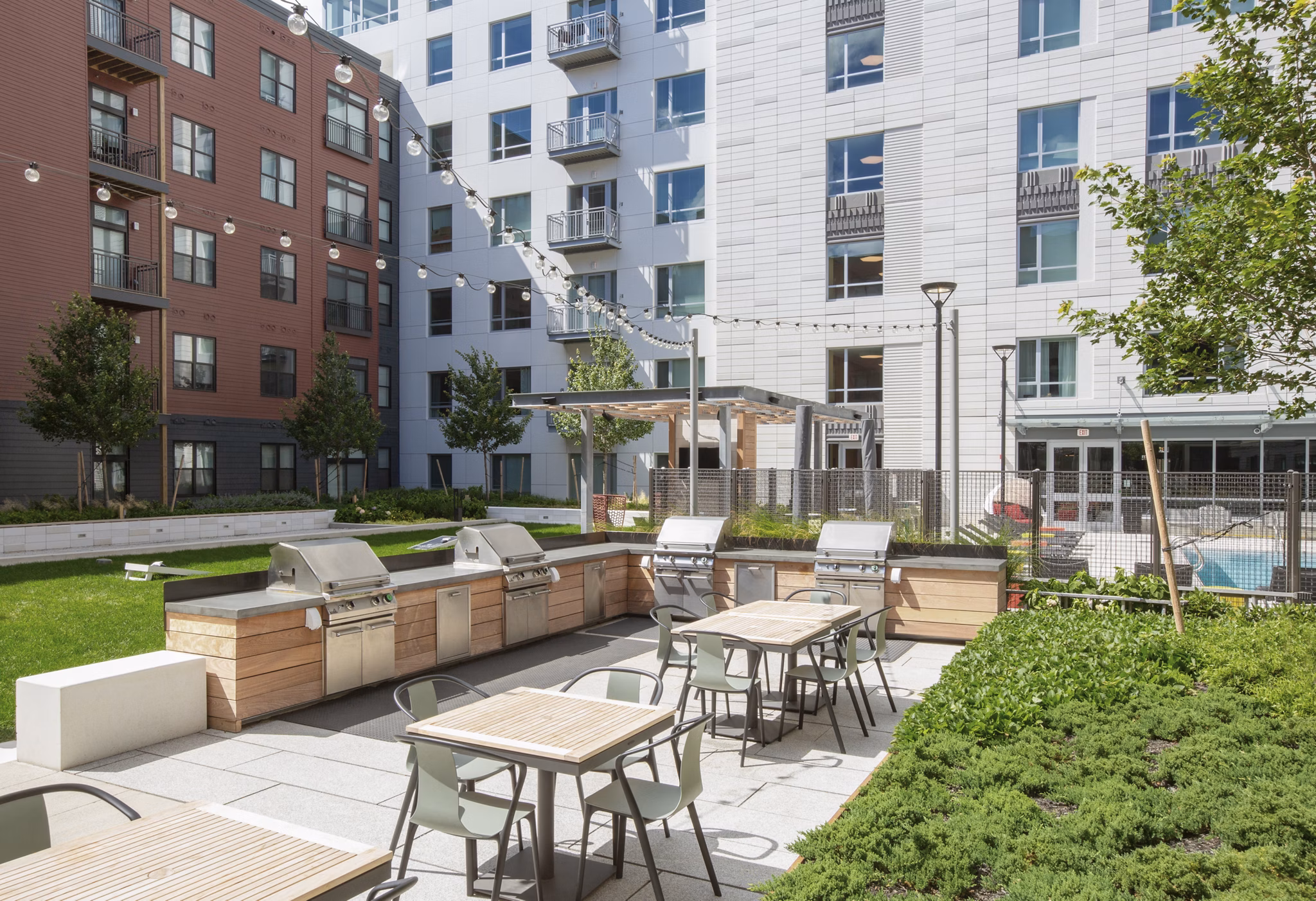 fire pit/grill area/patio at Harvest Apartments